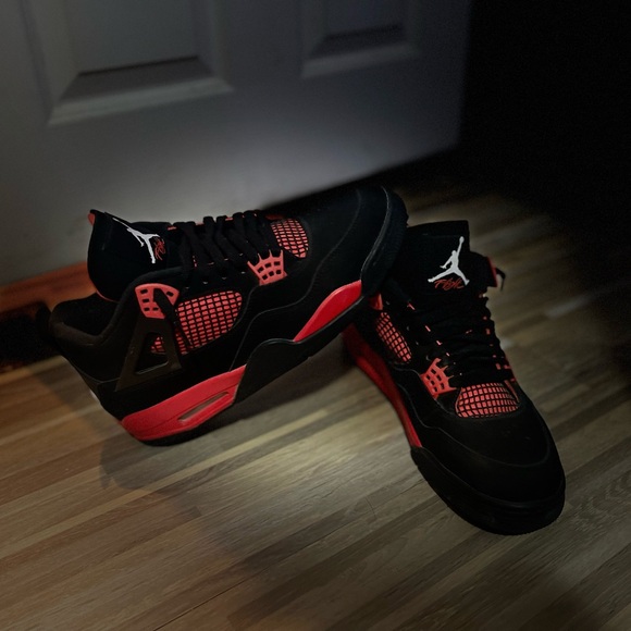 Thunder red Jordan 4s